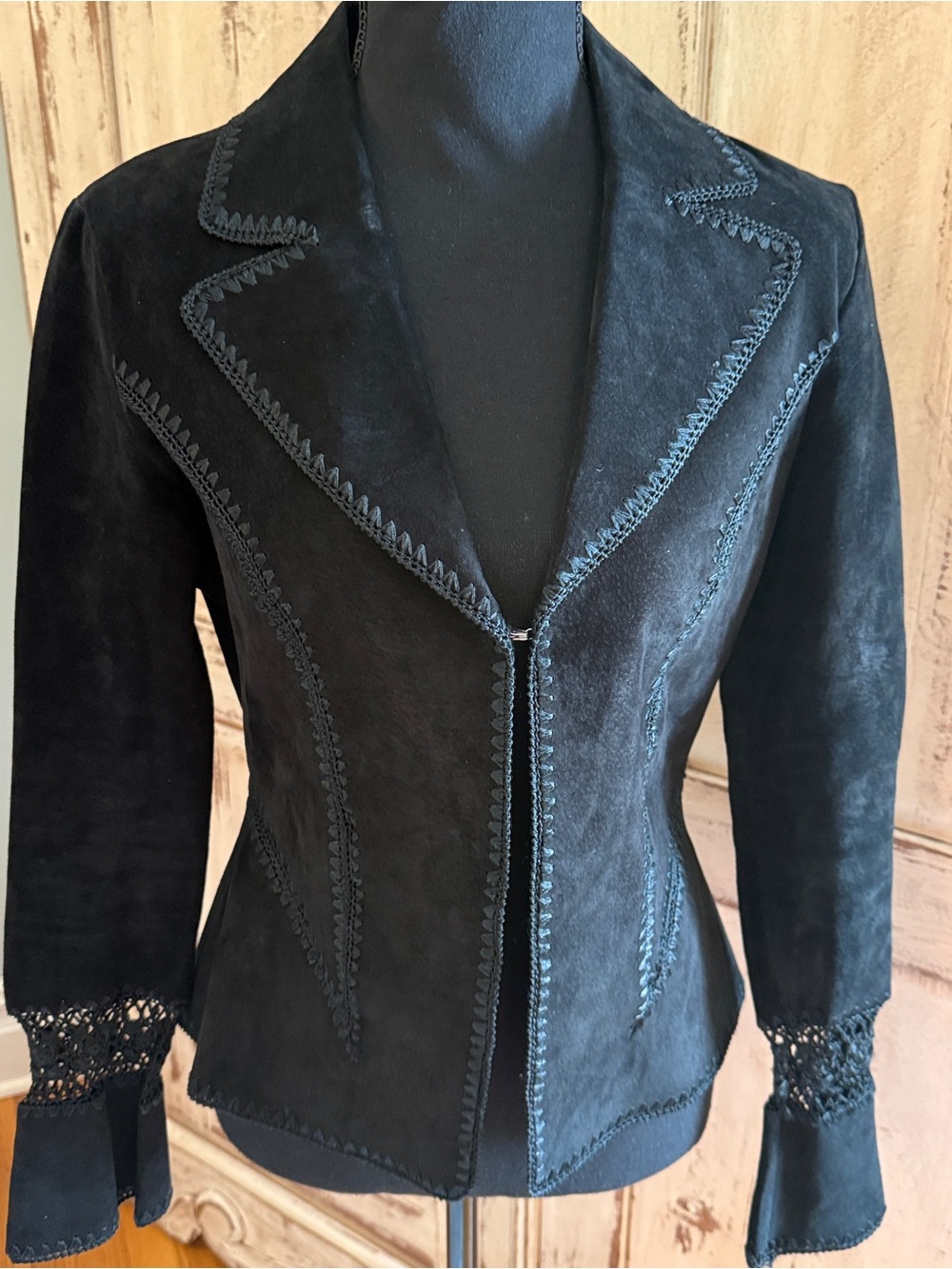 Mertillo black suede peplum boho style jacket w/crochet details. Medium